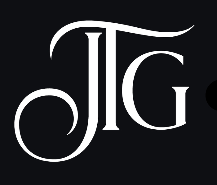 Portrait of author J.T. Geissinger