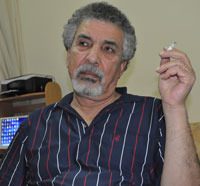 Portrait of author Mustafa Khalifa