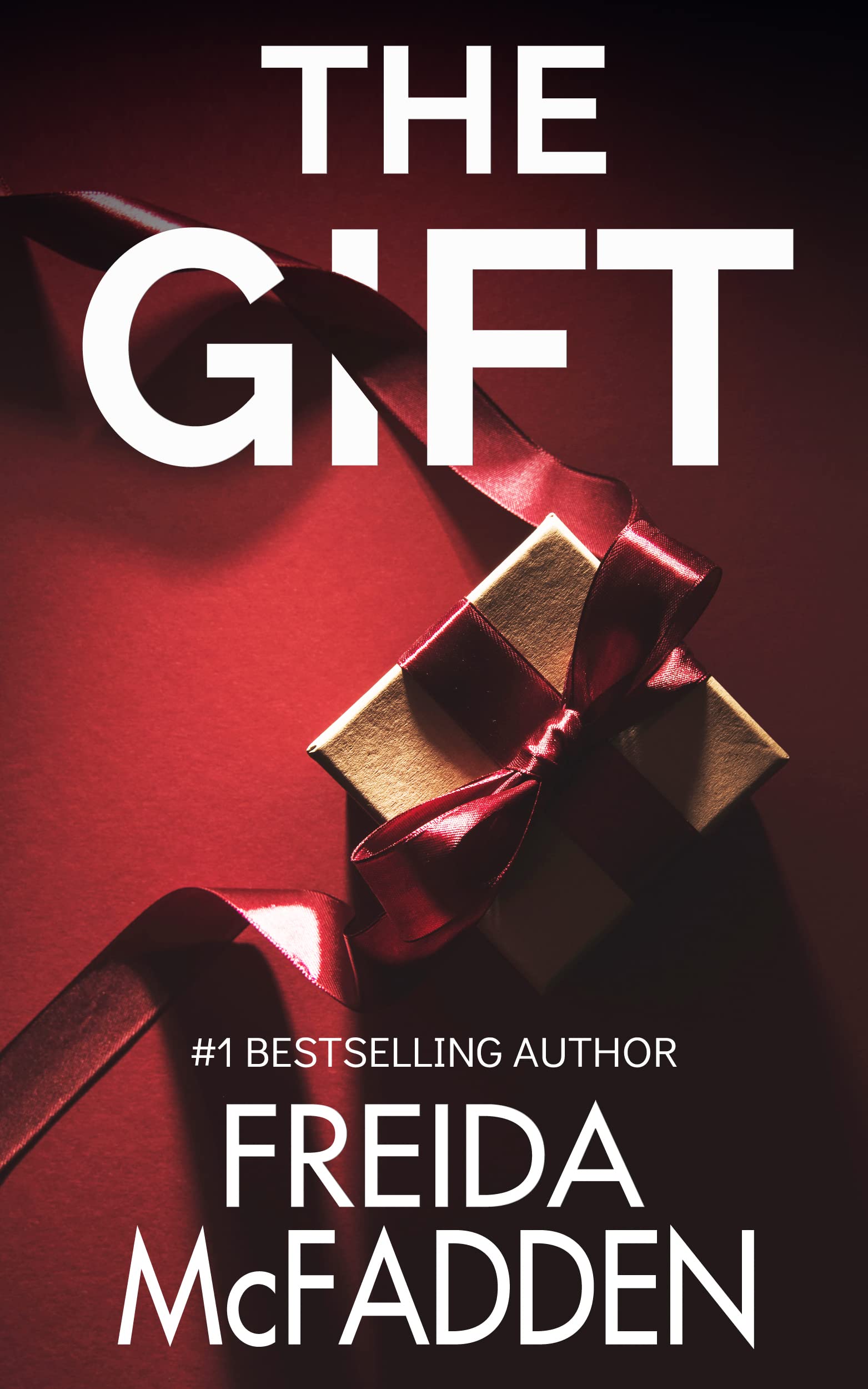 Book cover of The Gift by Freida McFadden Book cover of The Gift by Freida McFadden