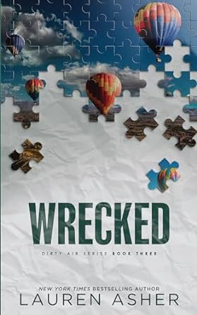 Book cover of Wrecked by Lauren Asher Book cover of Wrecked by Lauren Asher